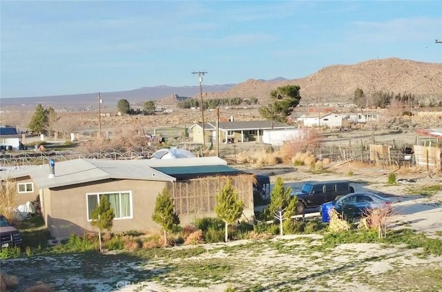 drone / aerial view featuring a mountain view