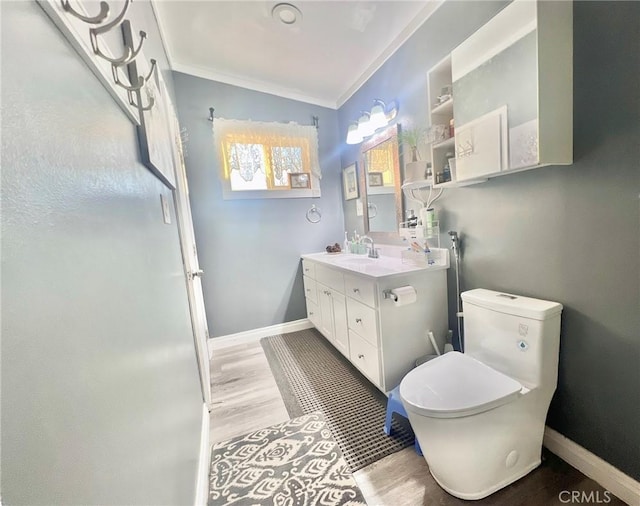 1166 El Mirage, El Mirage, CA 92301 - bathroom with ornamental molding, vanity, wood finished floors, toilet, and baseboards