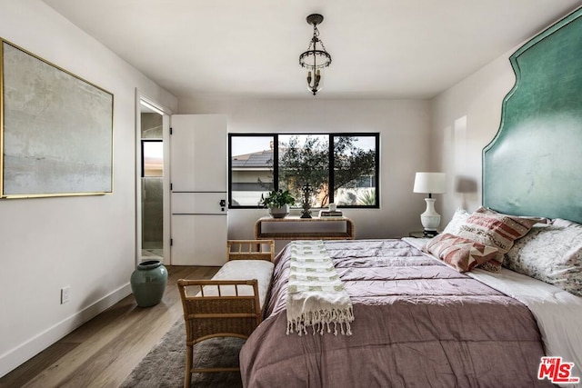 bedroom featuring hardwood / wood-style flooring