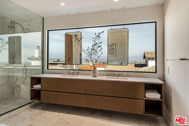 bathroom featuring vanity and a tile shower