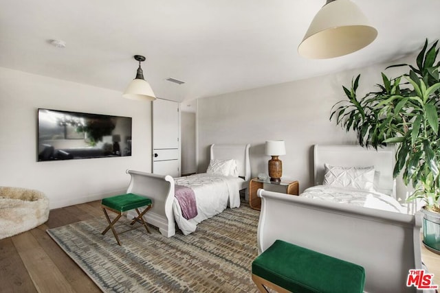 bedroom featuring hardwood / wood-style floors