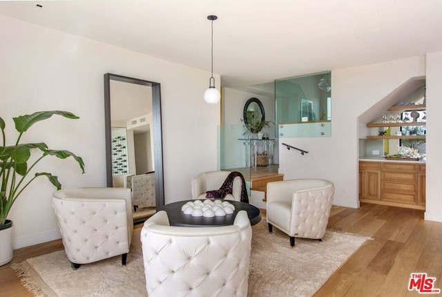 living area featuring light hardwood / wood-style floors