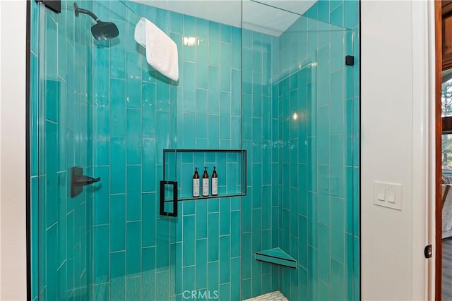 bathroom featuring an enclosed shower
