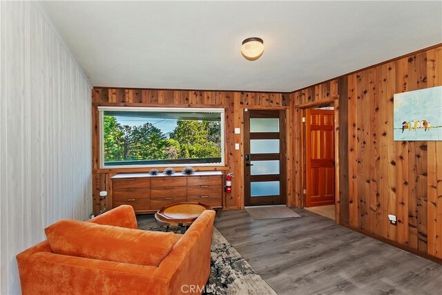 762 Zurich Dr, Lake Arrowhead, CA 92352 - sitting room with wooden walls and wood finished floors
