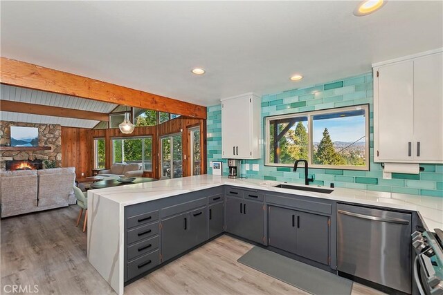 762 Zurich Dr, Lake Arrowhead, CA 92352 - kitchen featuring appliances with stainless steel finishes, a sink, a peninsula, gray cabinetry, and white cabinets