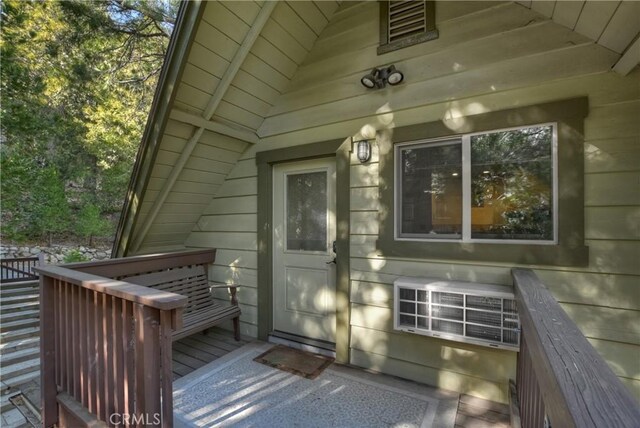 762 Zurich Dr, Lake Arrowhead, CA 92352 - view of exterior entry with a wooden deck