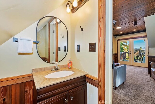 762 Zurich Dr, Lake Arrowhead, CA 92352 - bathroom featuring wood ceiling, french doors, and vanity