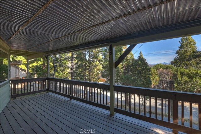 762 Zurich Dr, Lake Arrowhead, CA 92352 - deck featuring view of wooded area
