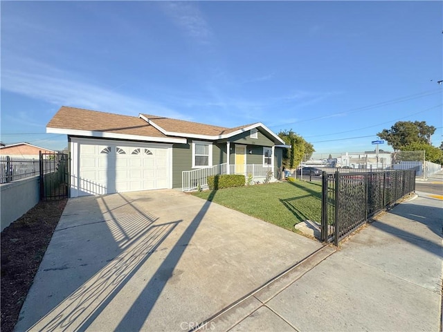 view of front facade with a front yard, covered porch, and a garage