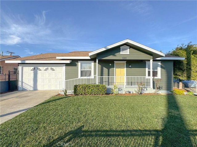 single story home featuring a front yard, covered porch, and a garage