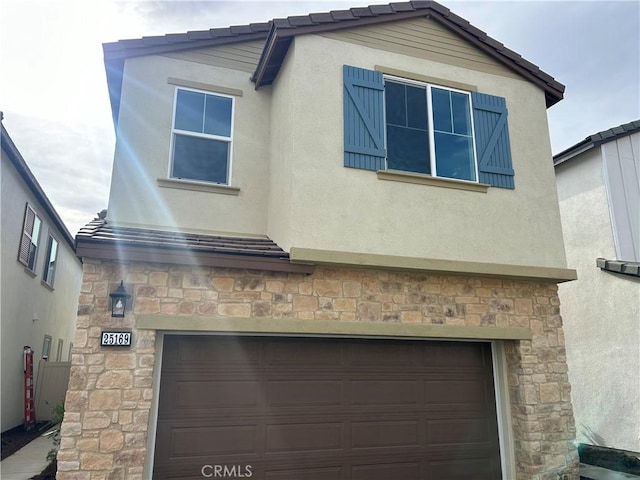 exterior space featuring a garage