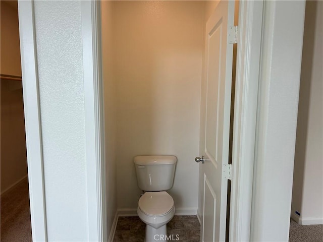 bathroom featuring toilet