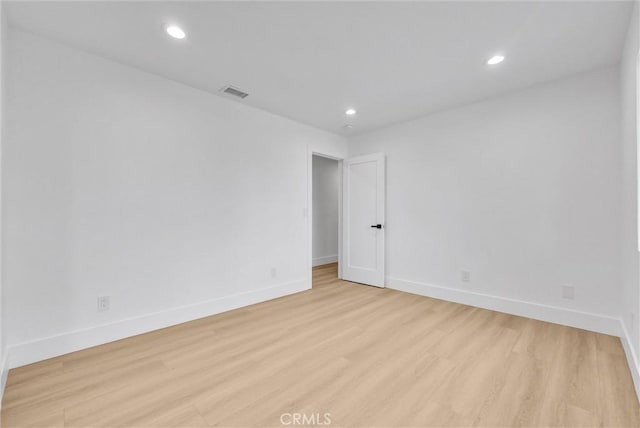 empty room with light wood-type flooring