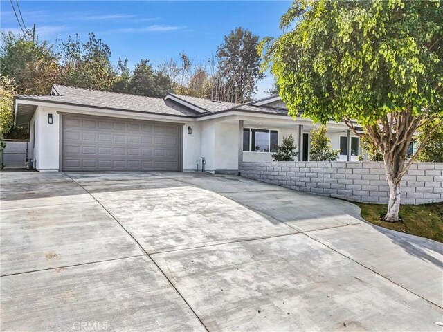 single story home with a garage