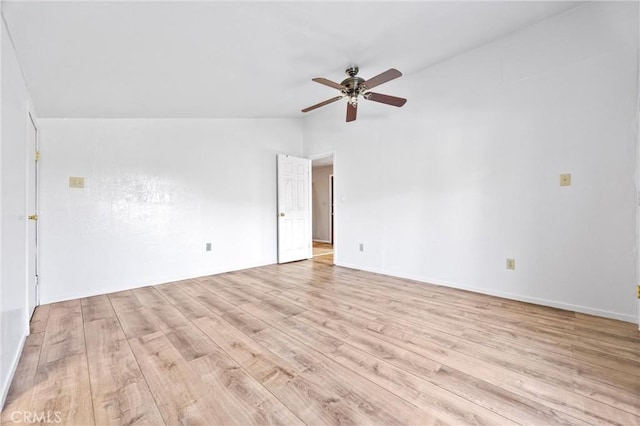 unfurnished room with ceiling fan, vaulted ceiling, and light hardwood / wood-style floors