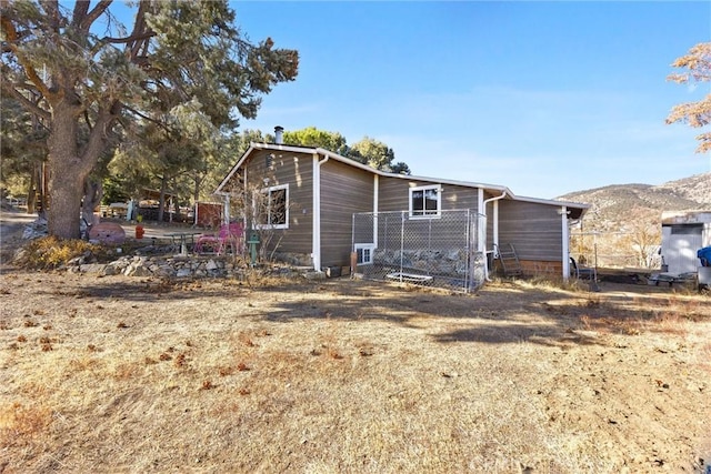 exterior space featuring a mountain view