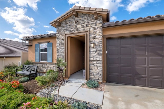 property entrance featuring a garage