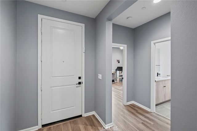 foyer featuring light hardwood / wood-style flooring