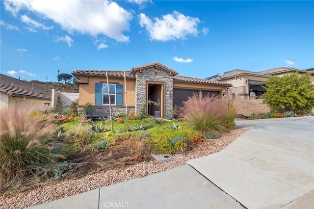 view of front of property with a garage