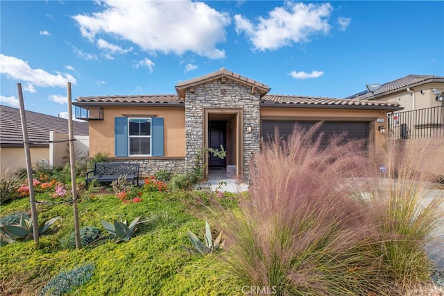 view of front of property featuring a garage