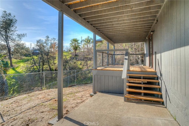 view of patio featuring a wooden deck