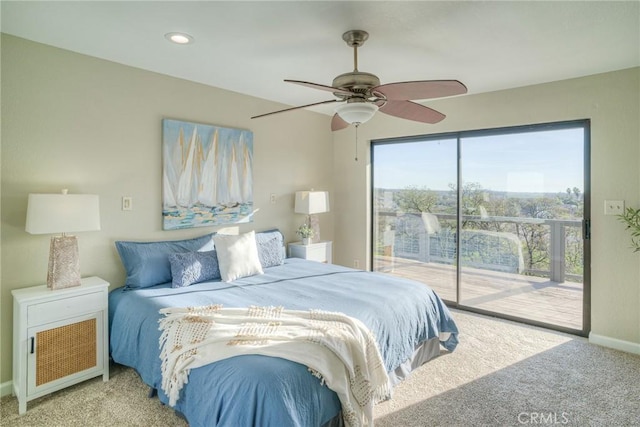 carpeted bedroom featuring access to exterior and ceiling fan