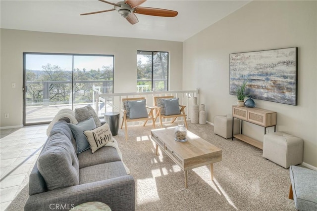 living room featuring lofted ceiling and ceiling fan