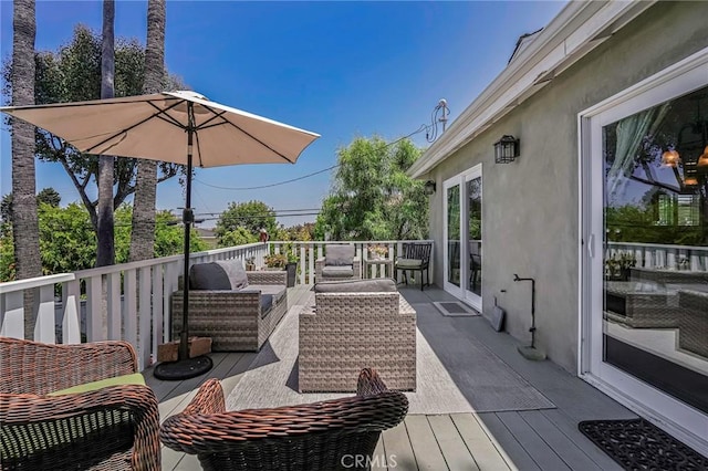 deck featuring an outdoor hangout area