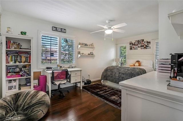 bedroom featuring ceiling fan and dark hardwood / wood-style flooring