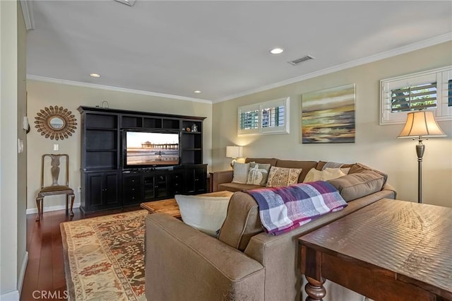 living room with ornamental molding and dark hardwood / wood-style flooring