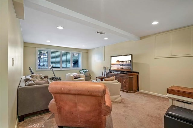 living room with light carpet and beamed ceiling