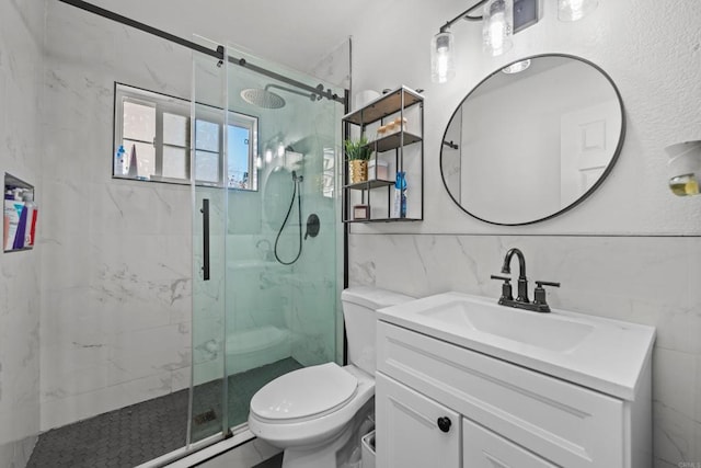 bathroom featuring walk in shower, vanity, tile walls, backsplash, and toilet