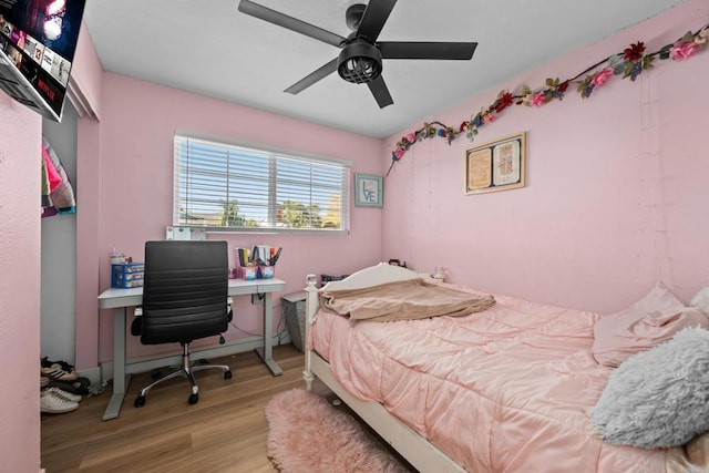 bedroom featuring ceiling fan and light hardwood / wood-style flooring