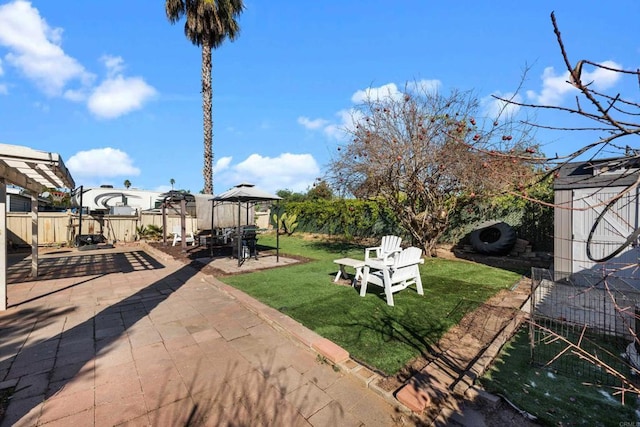 view of yard featuring a gazebo and a patio