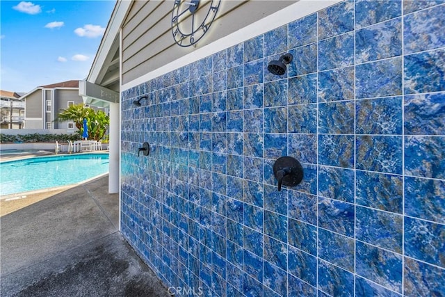 view of pool with a patio area and a fenced in pool