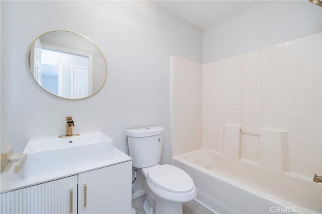 full bathroom with toilet, vanity, and shower / bathtub combination