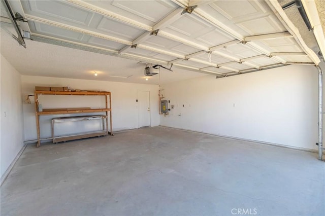 6213 Baileya Ave Unit 29, Palms, CA 92277 - garage with a garage door opener and water heater