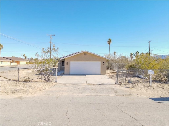 6213 Baileya Ave Unit 29, Palms, CA 92277 - single story home featuring an attached garage, fence, driveway, and stucco siding