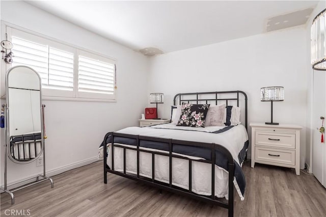 bedroom with light wood-type flooring