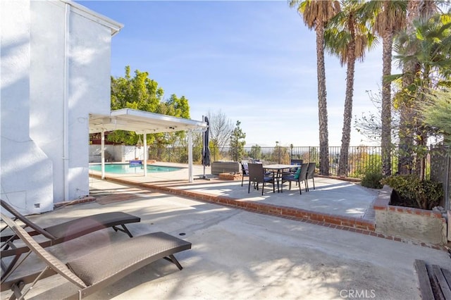 view of patio / terrace featuring a fenced in pool