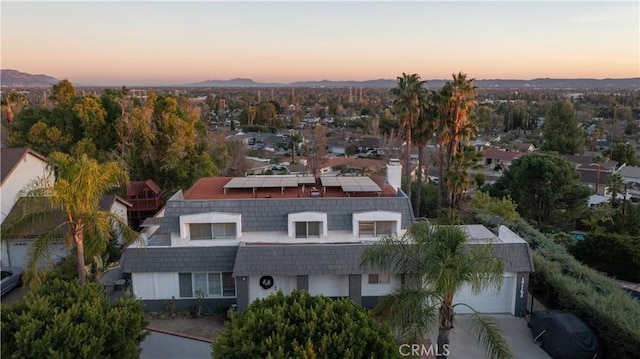 view of aerial view at dusk