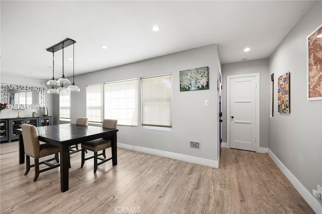 dining room with light wood-type flooring