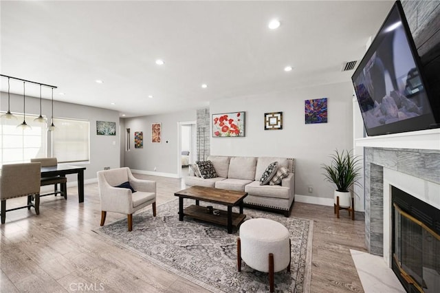 living room featuring light wood-type flooring