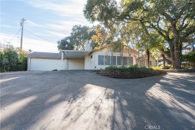 single story home with a garage