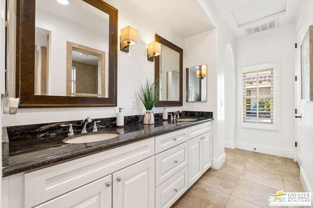 bathroom featuring vanity and tile patterned floors