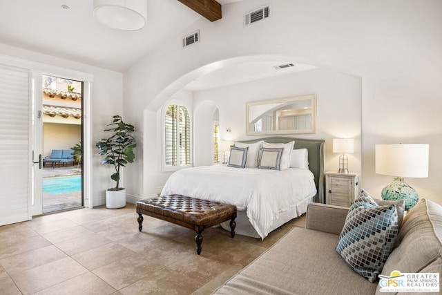 bedroom with access to exterior and lofted ceiling with beams