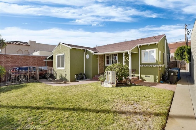 view of front of property with a front lawn