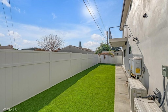 view of yard featuring ac unit