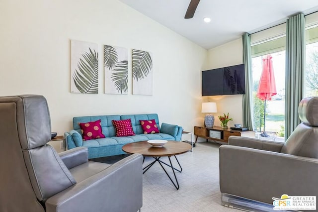 living room with ceiling fan and a healthy amount of sunlight