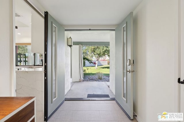 doorway to outside featuring french doors